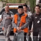 Memakai rompi oranye mantan Menteri Agama Yaqul  Cholil Qoumas kembali digiring ke Rutan KPK, Selama (24/3).