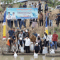 Penebaran benih ikan di Sungai Batang Merao, Desa Pinggir Air, Kecamatan Kumun Debai, Sungai Penuh