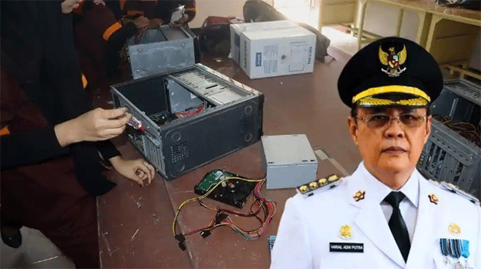 Eks Kadisdik Jambi Varial Adhi Putra berlatar siswi SMK lagi praktik. 