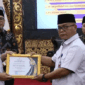 Kota Sungai Penuh meraih penghargaan nasional dalam Rakorda Bangga Kencana 2026 atas kontribusi penurunan stunting melalui program inovatif.