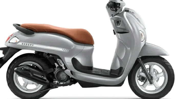 Intip transformasi Honda Scoopy 2026: warna baru, fitur canggih, & harga terbaru. /