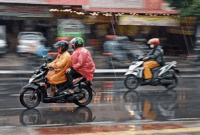 Ilustrasi pengendara motor saat hujan(KOMPAS.com/STANLY RAVEL)