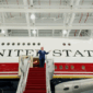 Presiden AS Donald Trump memberi isyarat saat ia meninjau pesawat VC-25B yang dihadiahkan oleh Qatar yang akan digunakan sebagai Air Force One, di Pangkalan Gabungan Andrews, Maryland, AS, Jumat (19/6/2026). Foto: Elizabeth Frantz/REUTERS