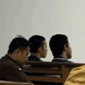 Dua terdakwa kasus rudapaksa di Padepokan Silat DPMA, Husni Mubarok dan Heri, saat duduk menjelang sidang pemeriksaan saksi. Keduanya dikeluarkan dari ruang sidang tertutup di Pengadilan Negeri Jambi