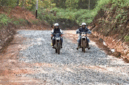 Bupati Kerinci Monadi saat Menggunakan Motor Trail Meninjau Pembangunan Jalan Renah Pemetik