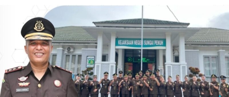 Ilustrasi Kejari Sungai Penuh  Robo Harianto, S.H., M.H.dan Kantor Kejaksaan Negeri Sungai Penuh.