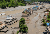 Foto udara suasana rumah yang terdampak banjir bandang dan tanah longsor di Nuwakot, Nepal, Kamis (27/8/2026)