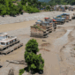 Foto udara suasana rumah yang terdampak banjir bandang dan tanah longsor di Nuwakot, Nepal, Kamis (27/8/2026)