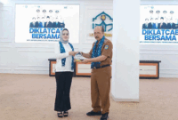 Asisten III, M. Rasyid, S.Pd., M.H., mewakili Wali Kota Sungai Penuh Alfin, S.H., saat membuka kegiatan tersebut di Aula Digital Perpustakaan Kampus IAIN Kerinci, Selasa (13/10/2026).